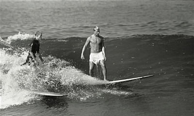 What are the potential risks for surfers at San Onofre State Beach?