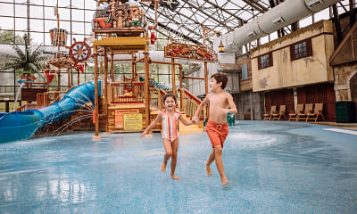 What measures can resorts and amusement parks implement to ensure water safety for their guests?